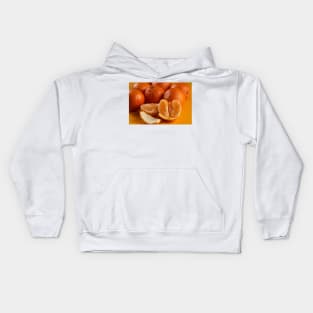 Oranges on a yellow background Kids Hoodie